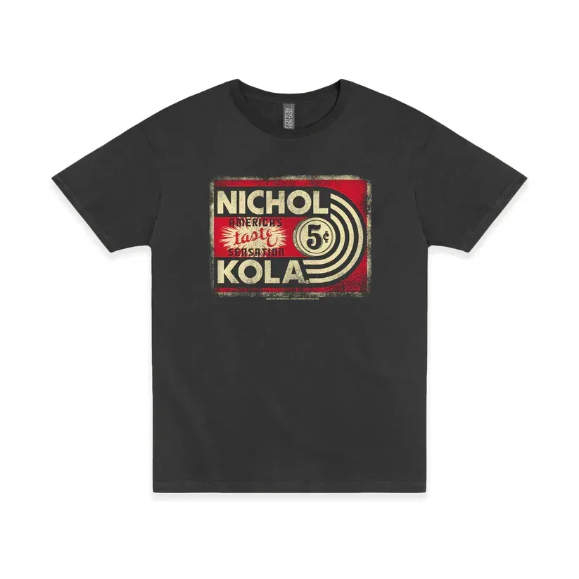 Black T-shirt with a vintage-style “Nichol Kola” logo in red, cream, and gold on the chest