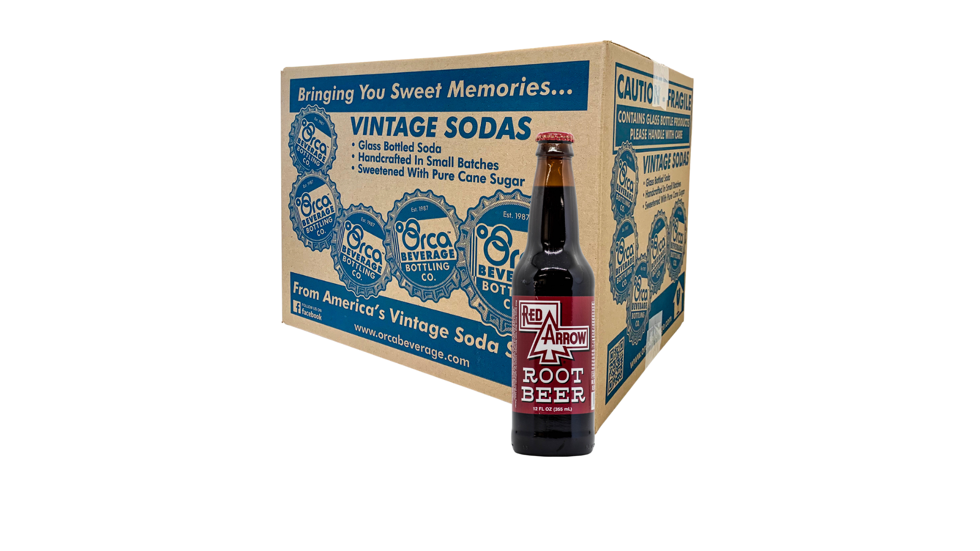A bottle of root beer is sitting in front of a box of vintage sodas.