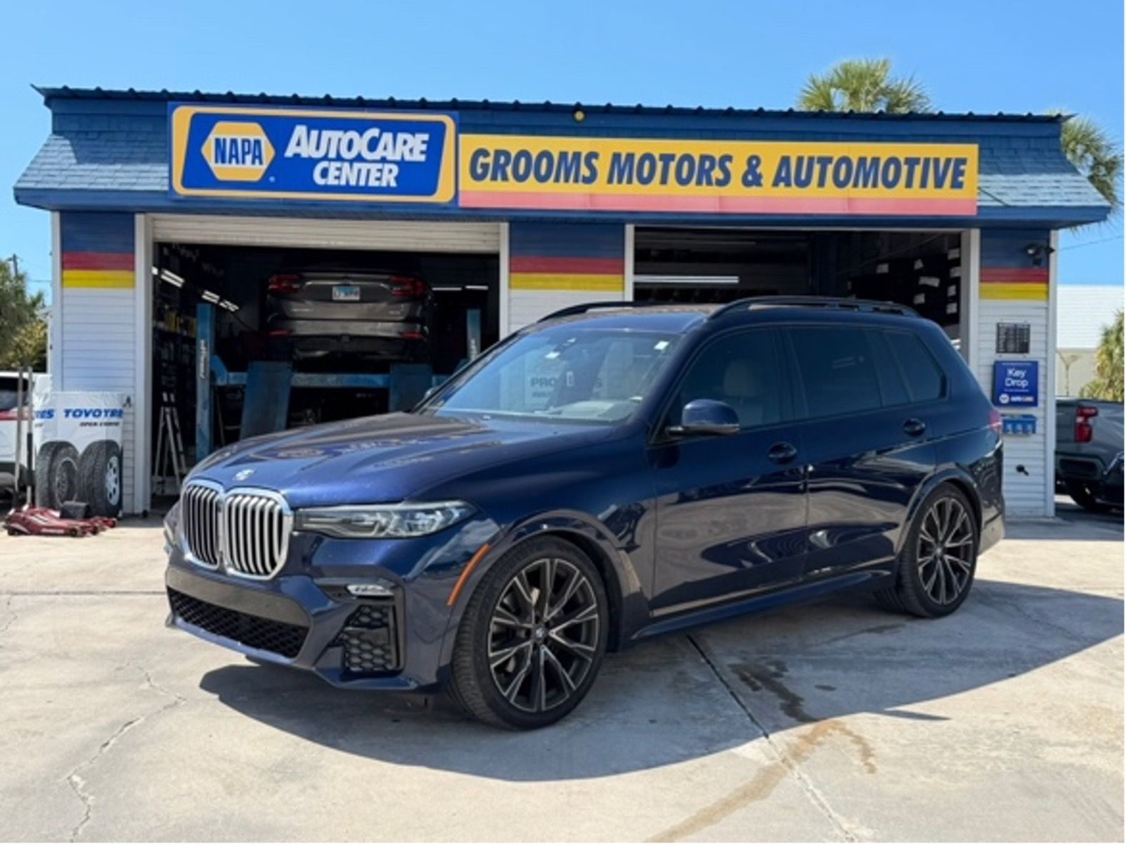 BWM In front of shop | Grooms Motors & Automotive