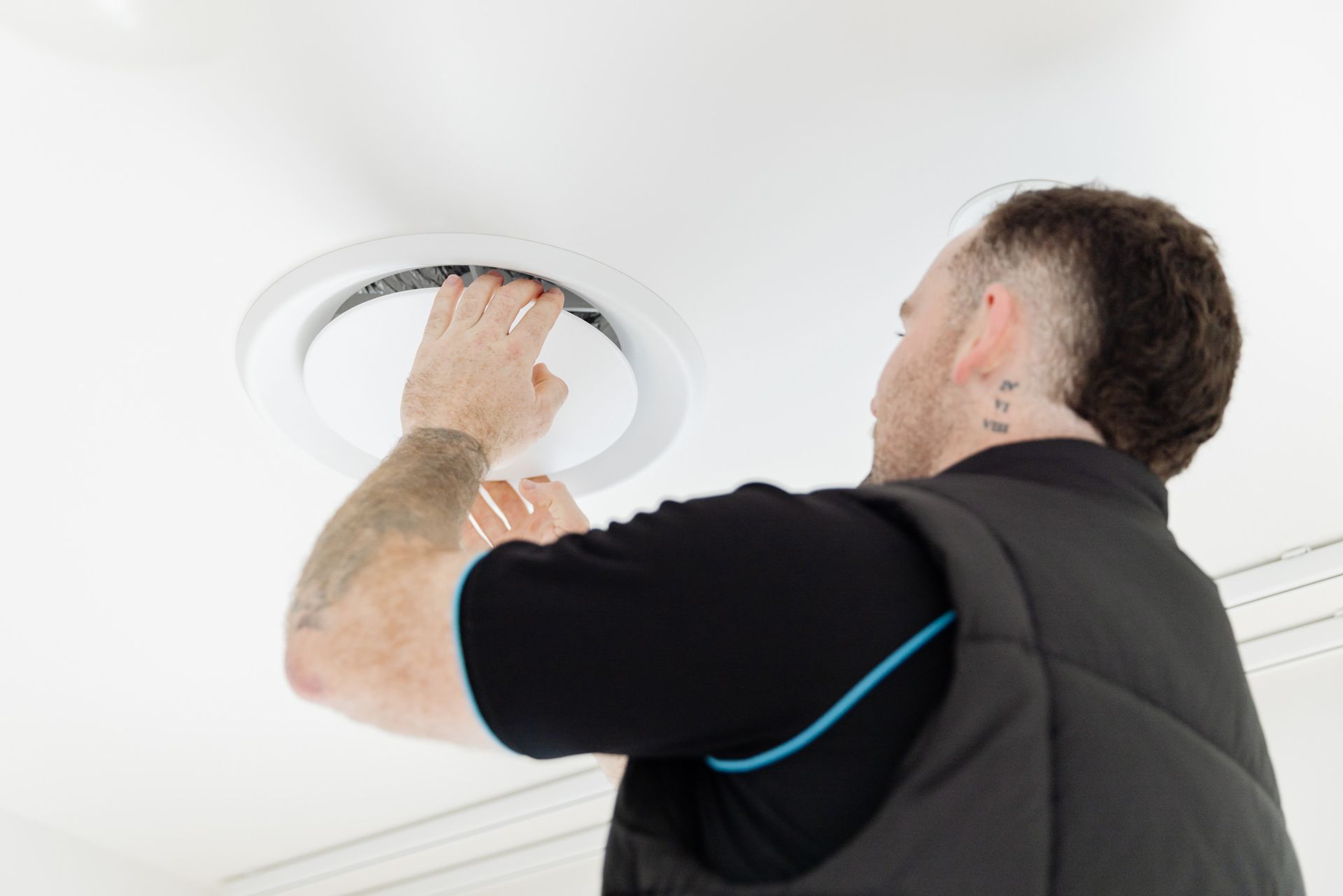 Professional HVAC inspection of ducted air conditioning system in Newcastle home