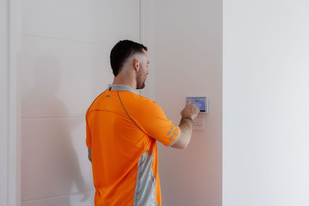 Image of Liam from Win Air And Electrical performing an AC service