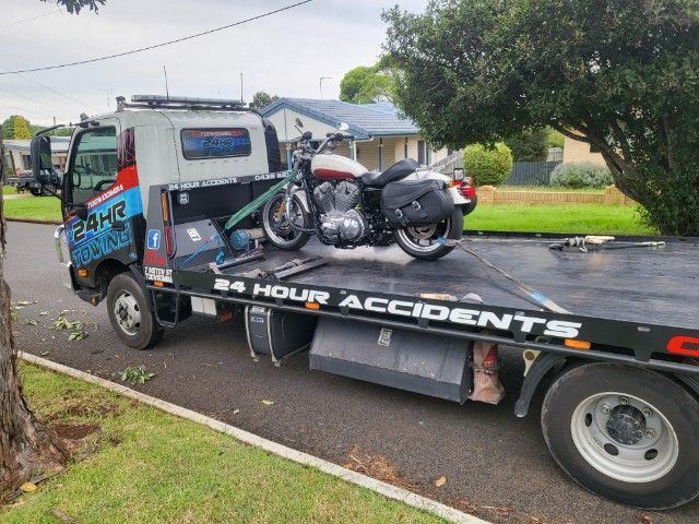 A Motorcycle is Sitting on The Back of a Tow Truck — Toowoomba 24hr Towing In Toowoomba QLD