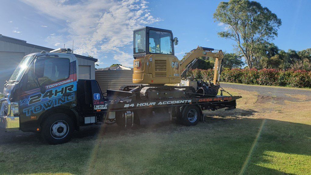 Towing A Yellow Excavator — Toowoomba 24hr Towing In Toowoomba, QLD
