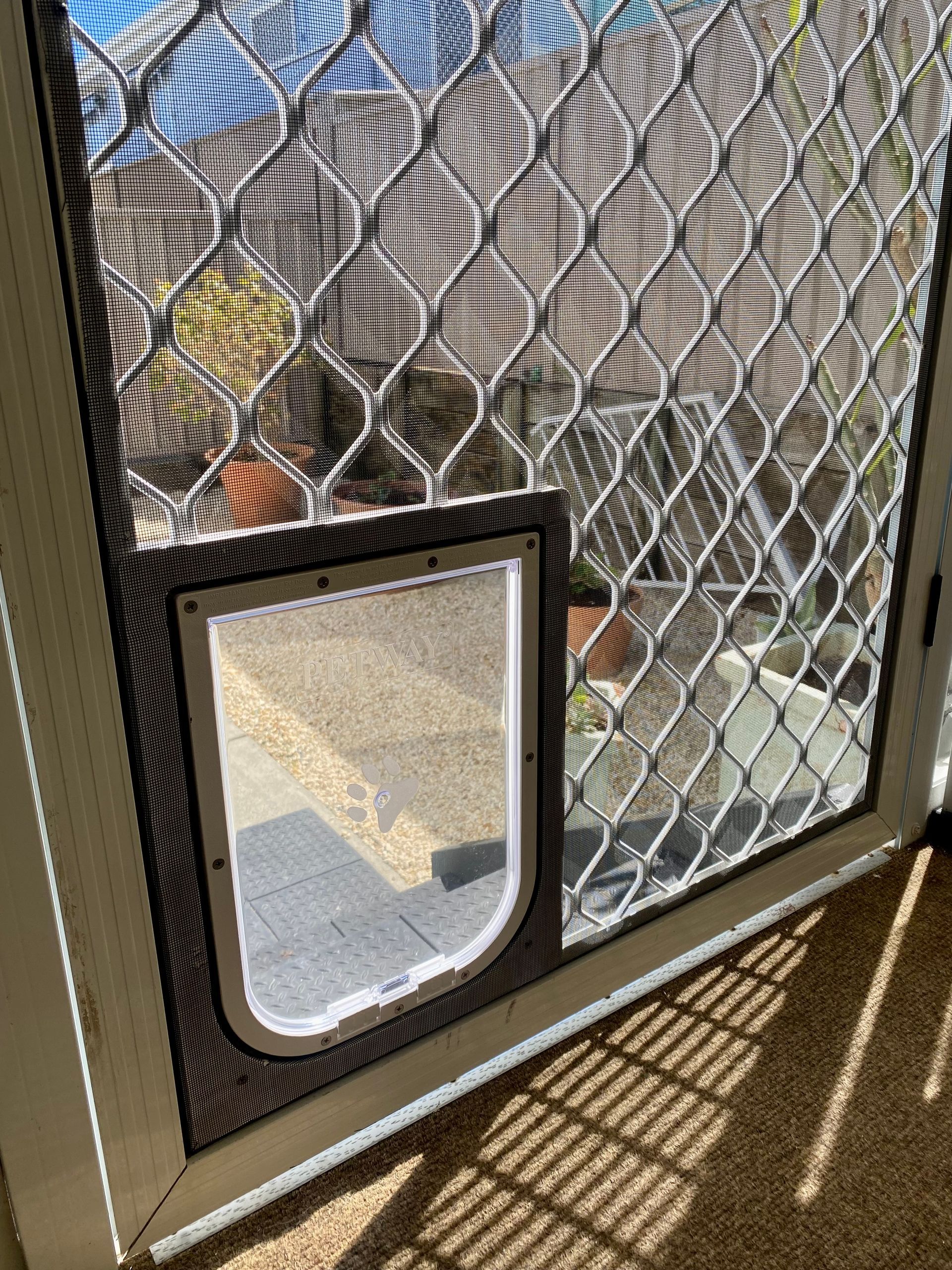 Screen Door With A Built-in Pet Door — Fix-A-Door in Raymond Terrace, NSW
