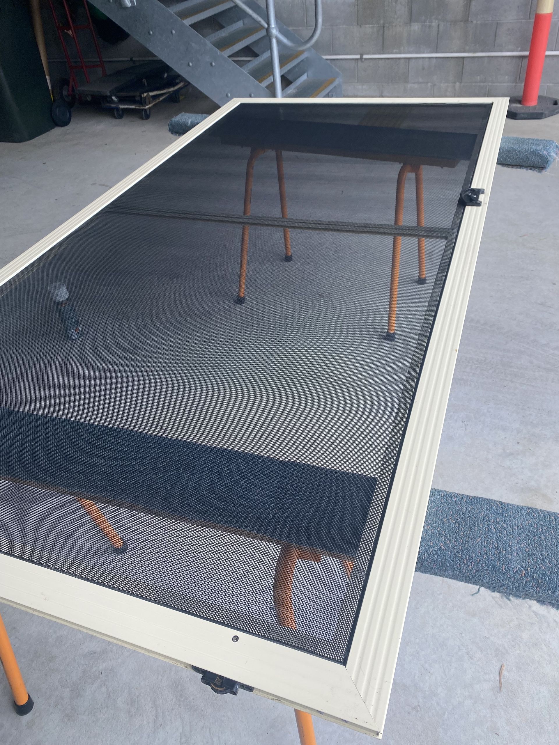 A Rectangular Screen Door With A Black Mesh — Fix-A-Door in Raymond Terrace, NSW