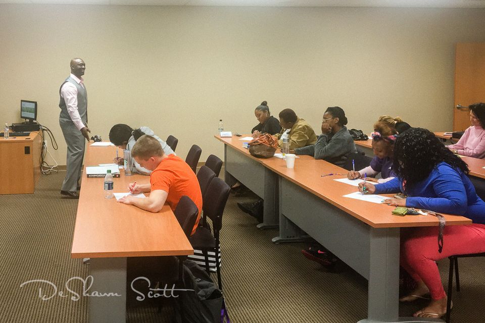 DeShawn Scott speaking on personal branding to a college class. 