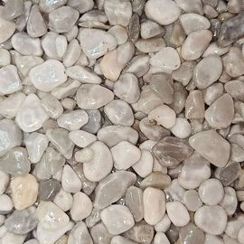 Smooth, light gray and white pebbles.