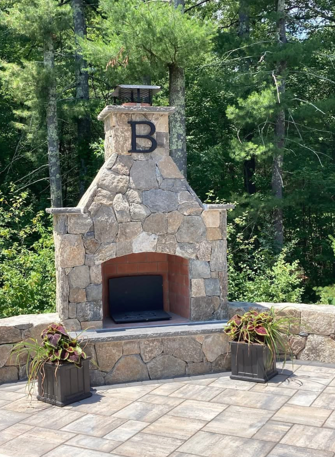 Stone outdoor fireplace with chimney, 