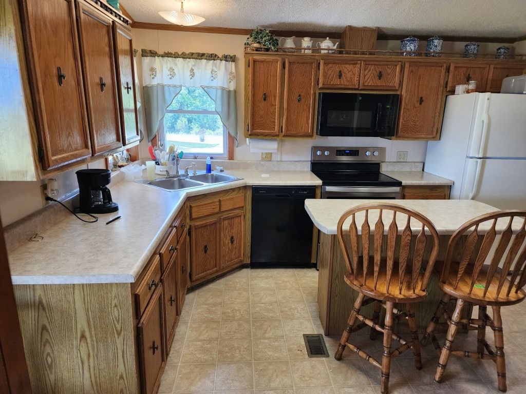 Real Estate Auction in Nixa, MO Stevens Auction Service