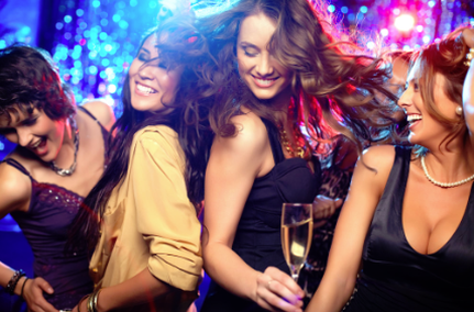 This is a picture of four woman dancing and having fun at a Calgary DJ Corporate party.