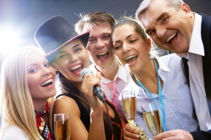 This is a picture of 5 people posing for a photo at a party.