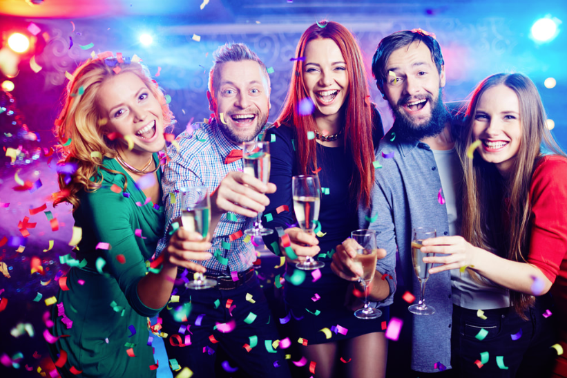 This is a picture of five people posing and smiling for the camera at a DJ private party.