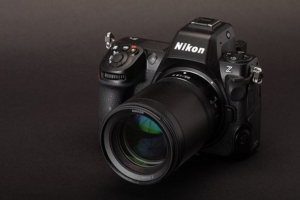 A close up of a sony camera with a lens attached to it.