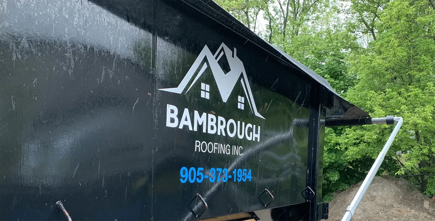 Black dumpster with 