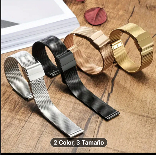Correas de reloj de metal en plata, negro, oro rosa y oro sobre una superficie de madera,