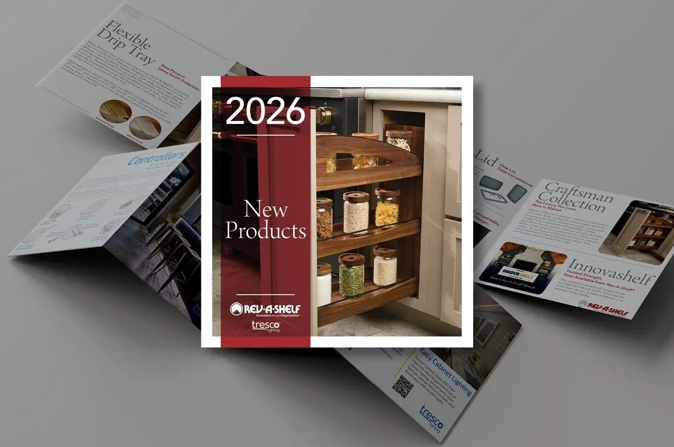 2026 product catalog mockup with a wooden shelf and brochures on a gray background
