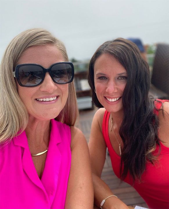 two women smiling