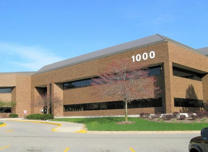 Brown brick building with the number 