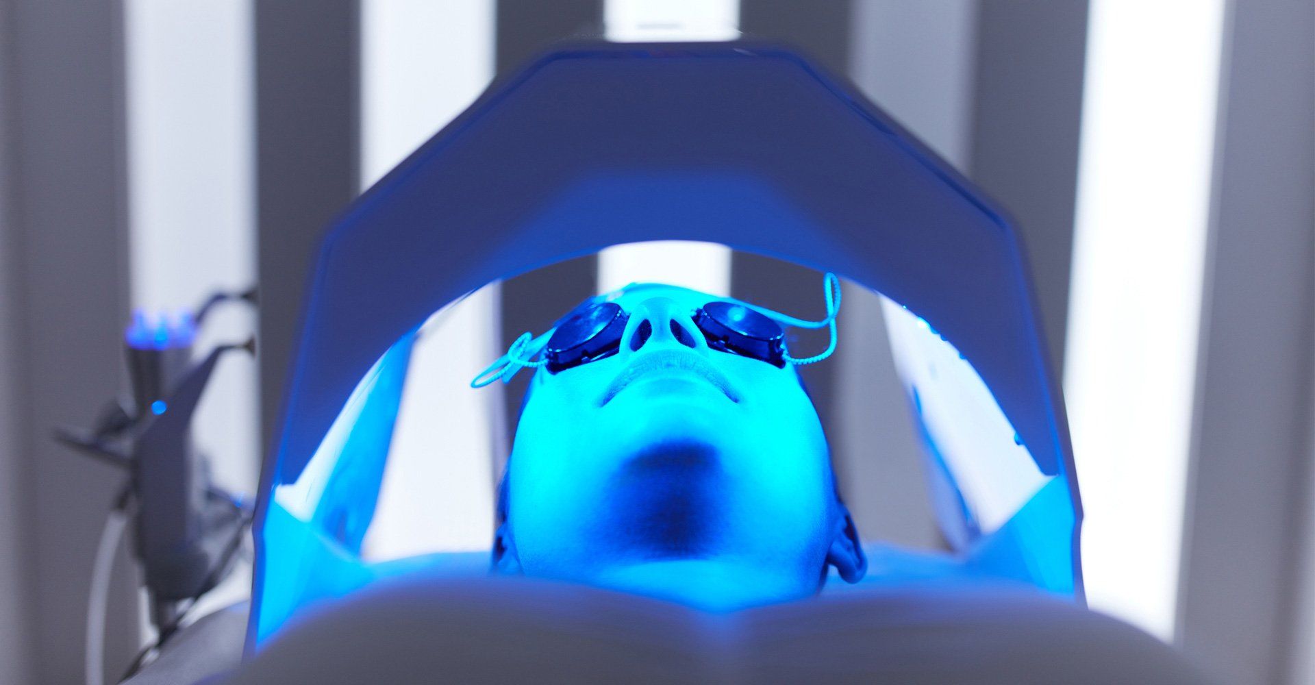 Woman Having Phototherapy — Fort Gratiot, MI — Hamzavi Dermatology & Dermatology Specialists Woman Having Phototherapy — Fort Gratiot, MI — Hamzavi Dermatology & Dermatology Specialists