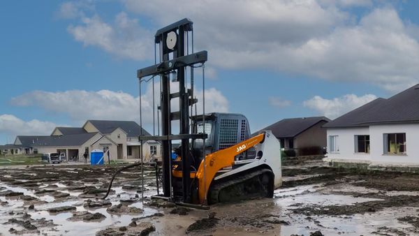 Skid Steer performing water injection