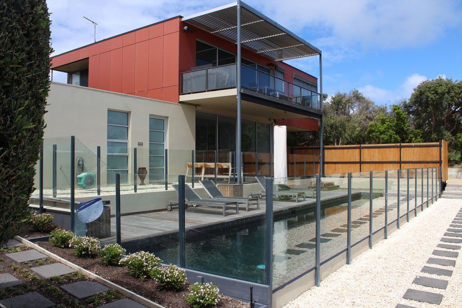 Glass Wall Of A Pool — Rye, VIC — Quin Wyatt Building Designers