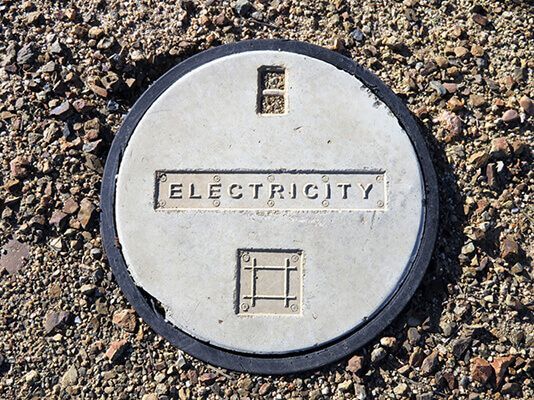 Sign Covering an Electrical Pit — Electrical Services in Uralla, NSW