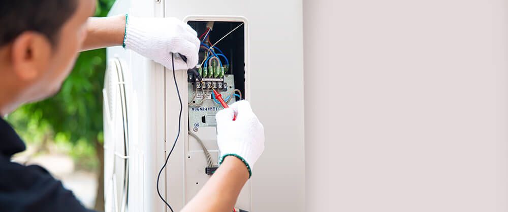 Air Conditioner Repairman — Electrical Services in Walcha, NSW