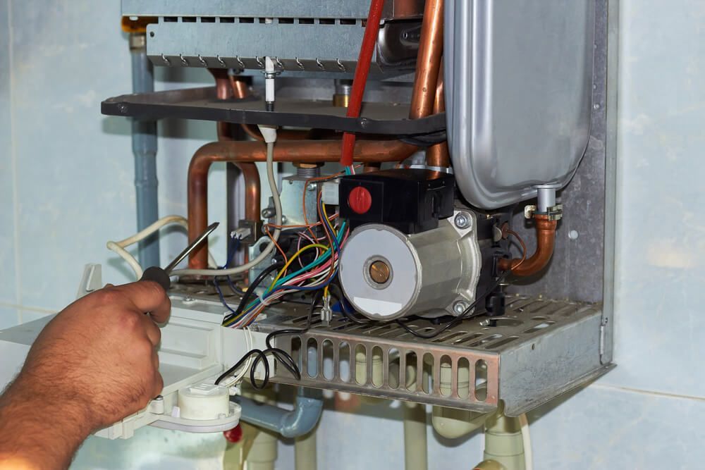 Servicing Water Heater — Electrical Services in Armidale, NSW