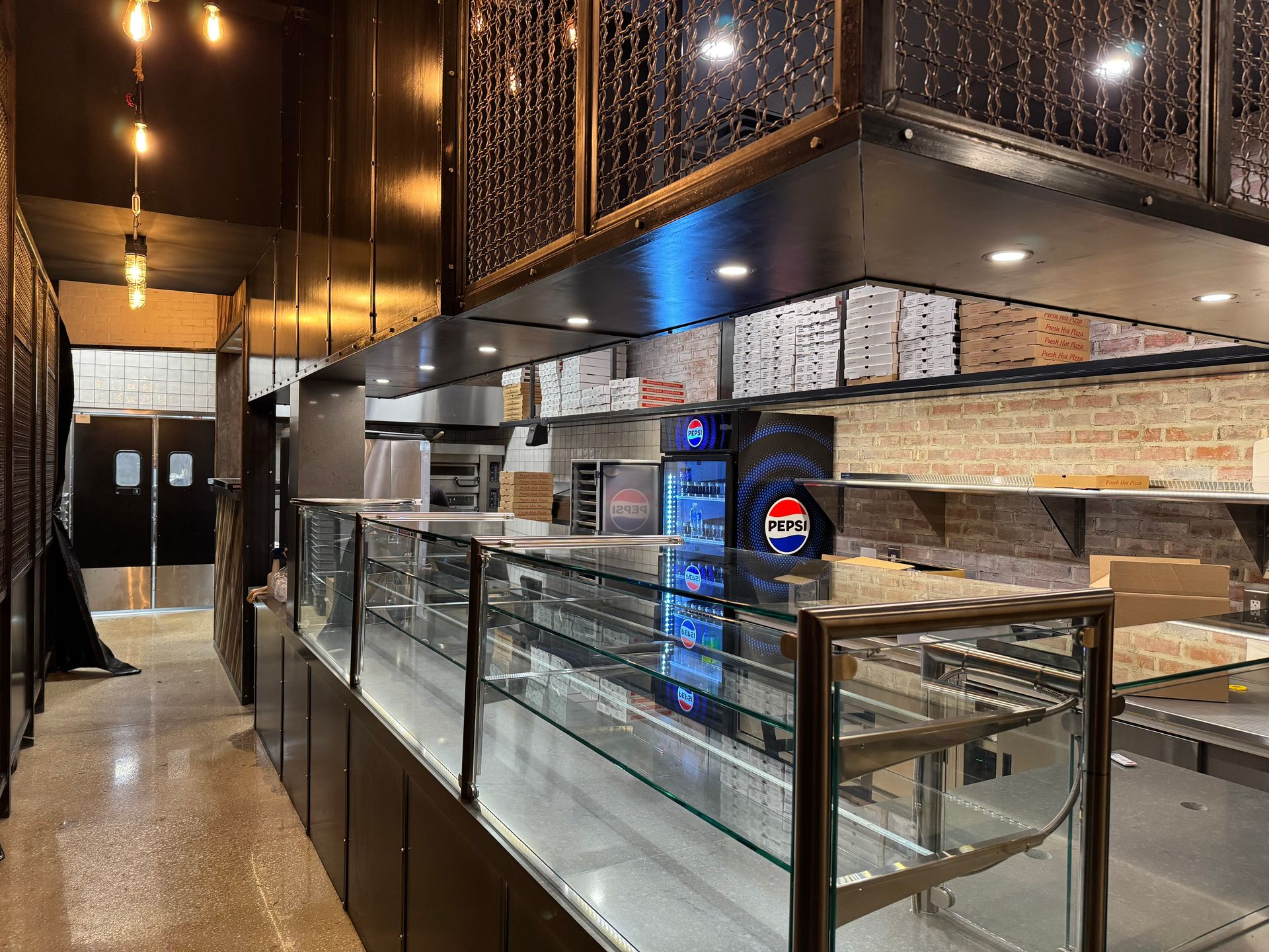 Modern commercial restaurant interior with decorative pendant lighting fixtures