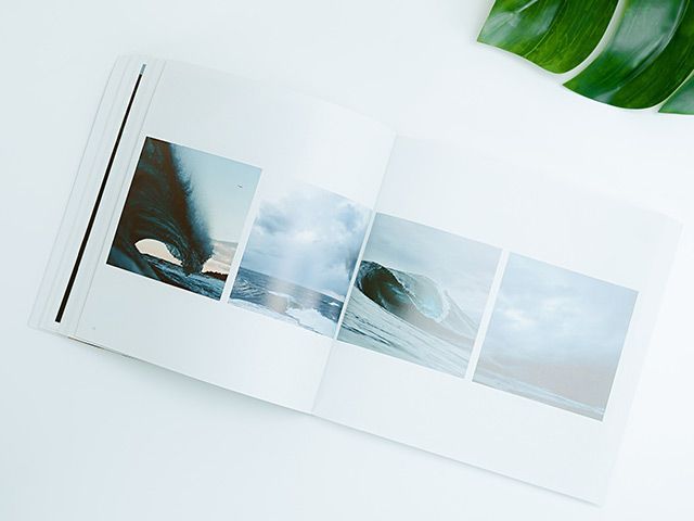 A printed book with a picture of a man and a woman on the beach