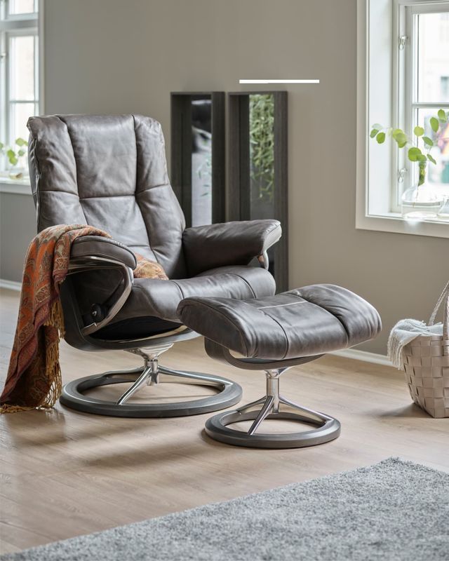 Grey Leather Recliner Chair With Matching Ottoman — Hastings Specialty Furniture In Port Macquarie, NSW