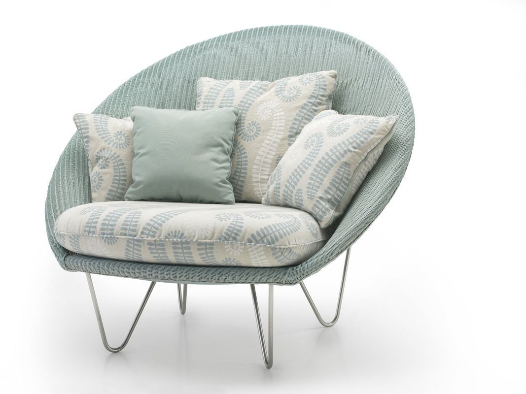 Light Blue Woven Egg-shaped Chair With Patterned Pillows — Hastings Specialty Furniture In Port Macquarie, NSW