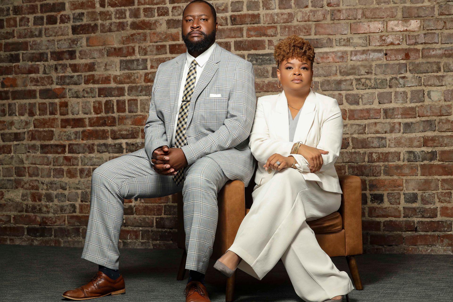 Two people sitting.