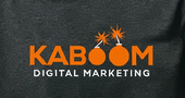 A black shirt that says kaboom digital marketing