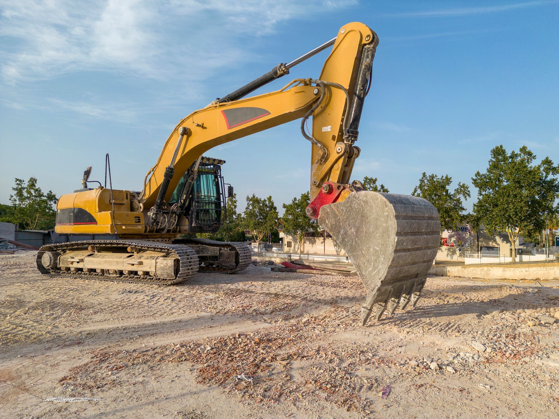A yellow backhoe.