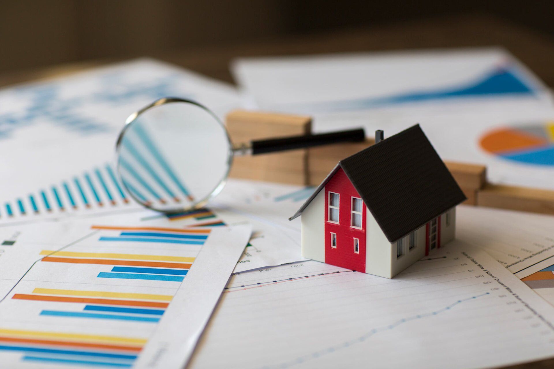 Miniature House On A Financial Graph — Reno, NV — The Law Office of Carole M Pope, APC