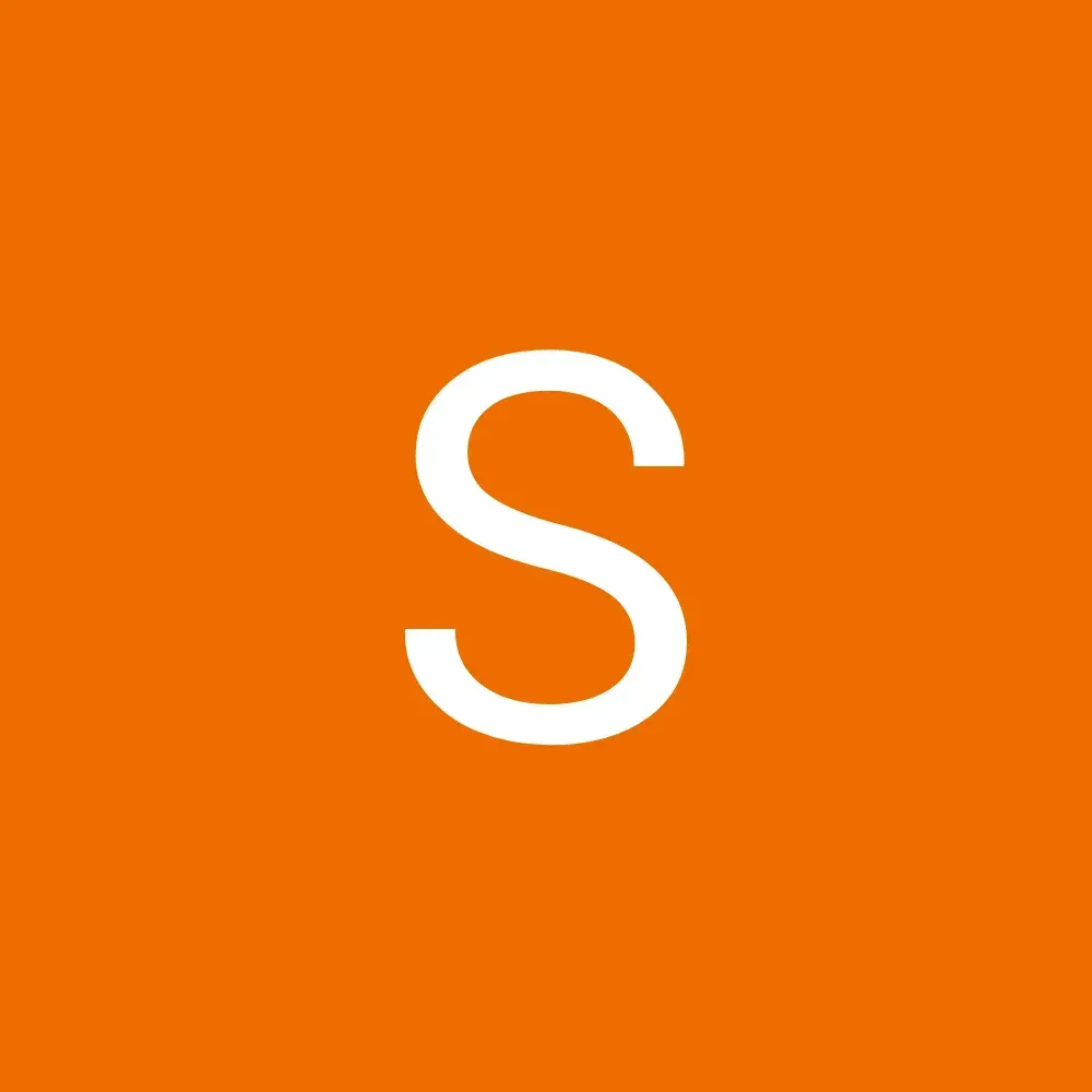 White letter “S” on an orange background