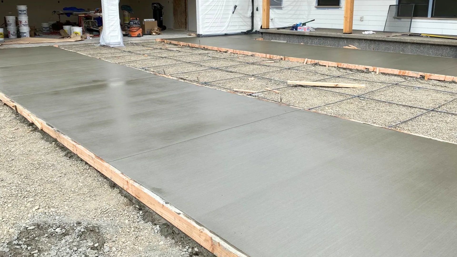 Poured concrete foundation with footings under construction at a Bellingham WA home site.