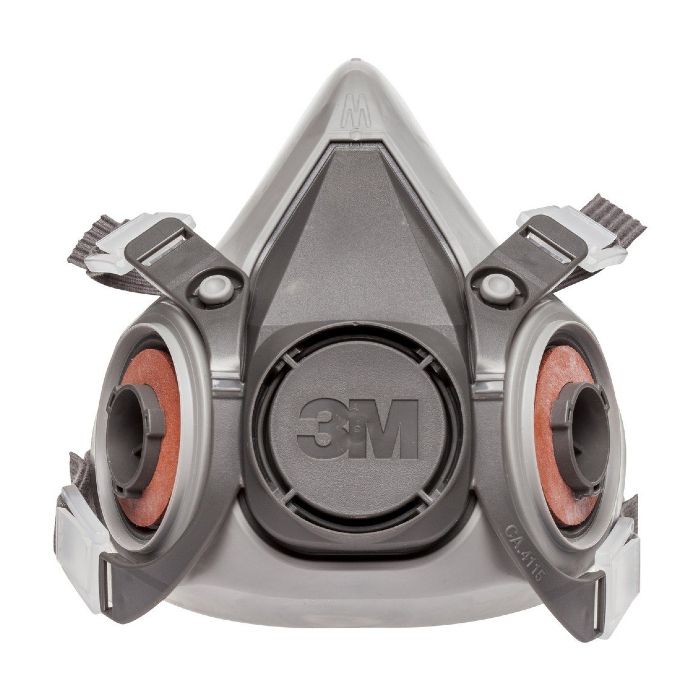Respirador de media cara 3M gris con correas ajustables y accesorios para filtros.