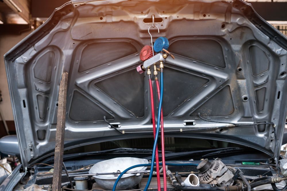 AC being recharged | Elite Autocare of Princeton