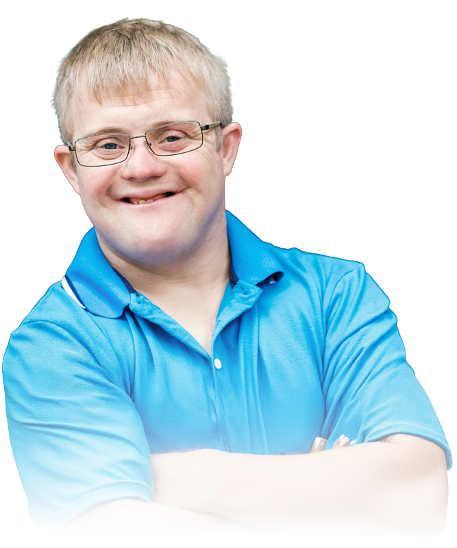 Person in a bright blue shirt and glasses, smiling with arms crossed on a white background