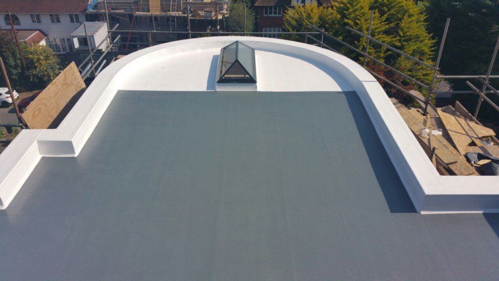 The roof of a building with a dome on top of it.