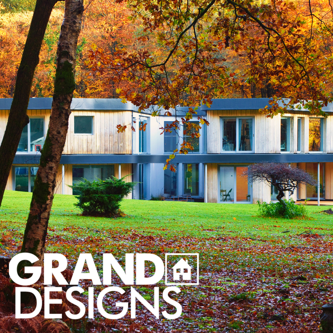 A picture of a house with the words grande designs on the bottom