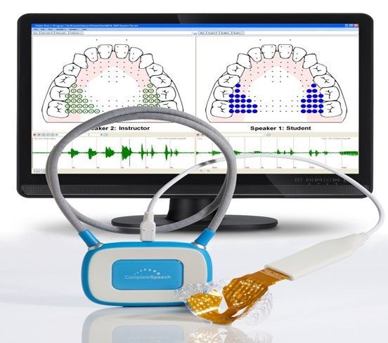 Dental device with screen showing teeth diagrams and audio waveforms; device held near a mouth.