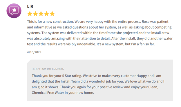 Customer review screenshot with 5-star rating and thank-you reply message below