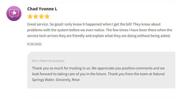 Screenshot of a Google review praising friendly service with a business reply thanking the customer