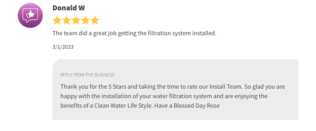Customer review with five stars praising a water filtration system installation and service.