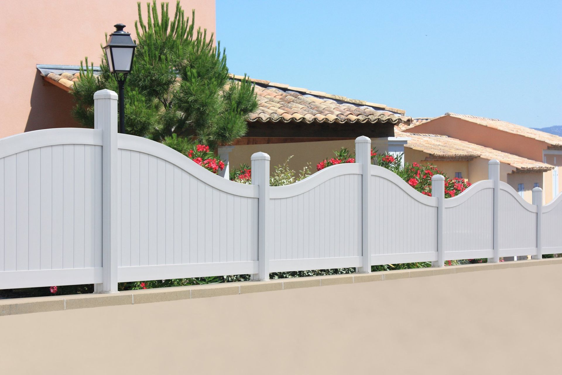 wavy white fence