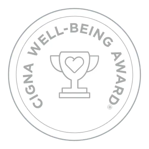 Cigna Well-Being Award logo: a gray circle with the text 