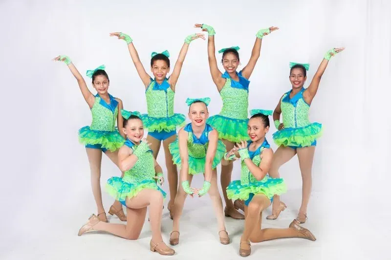 A Group Of Young Girls In Green And Blue Tutus Are Posing For A Picture — International Dance Affair In North Mackay, QLD